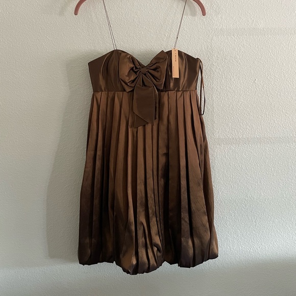 kate spade Dresses & Skirts - Issue babydoll bubble style dress bronze